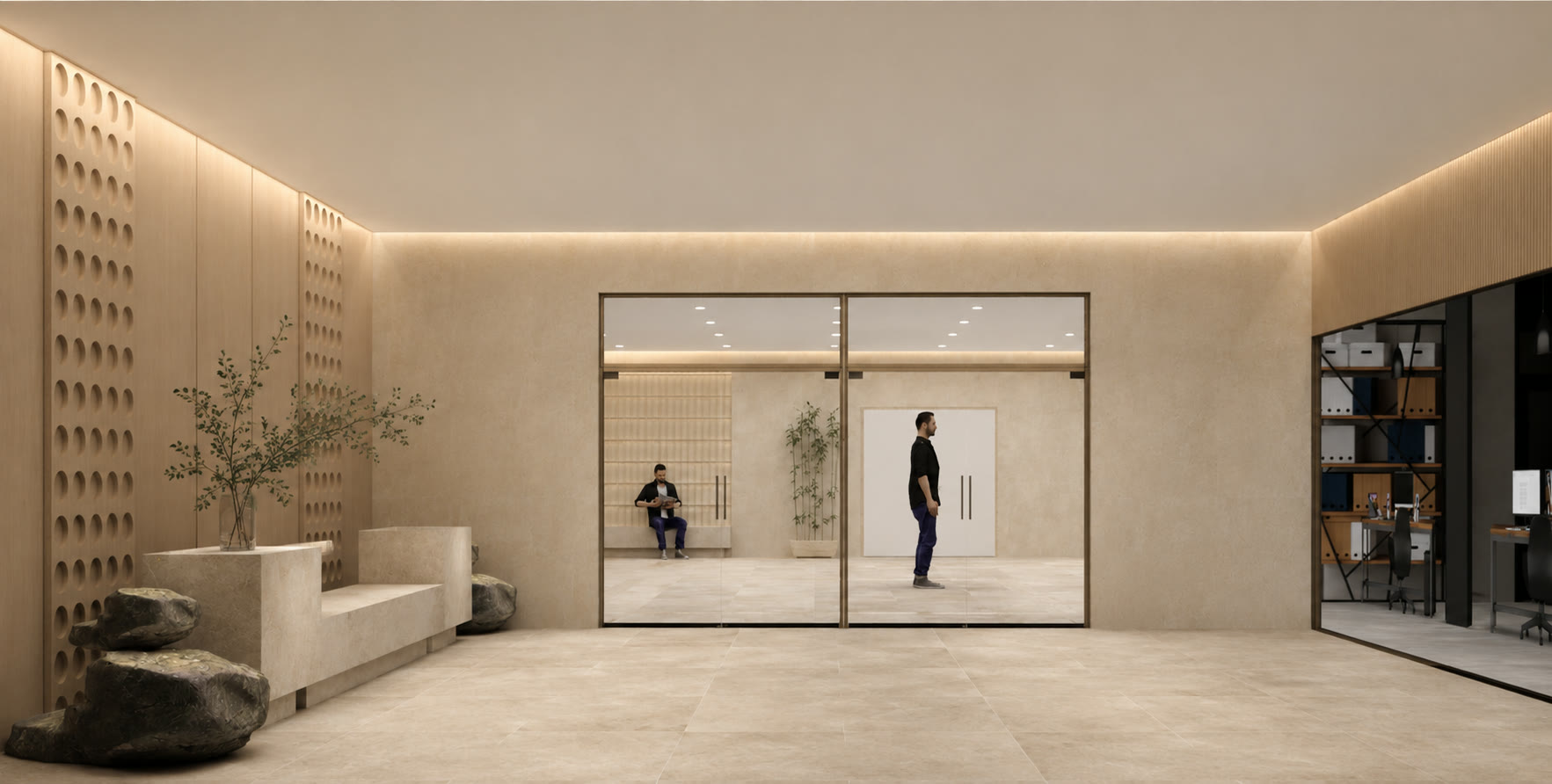 Entrance lobby with perforated stone walls and glazed doors